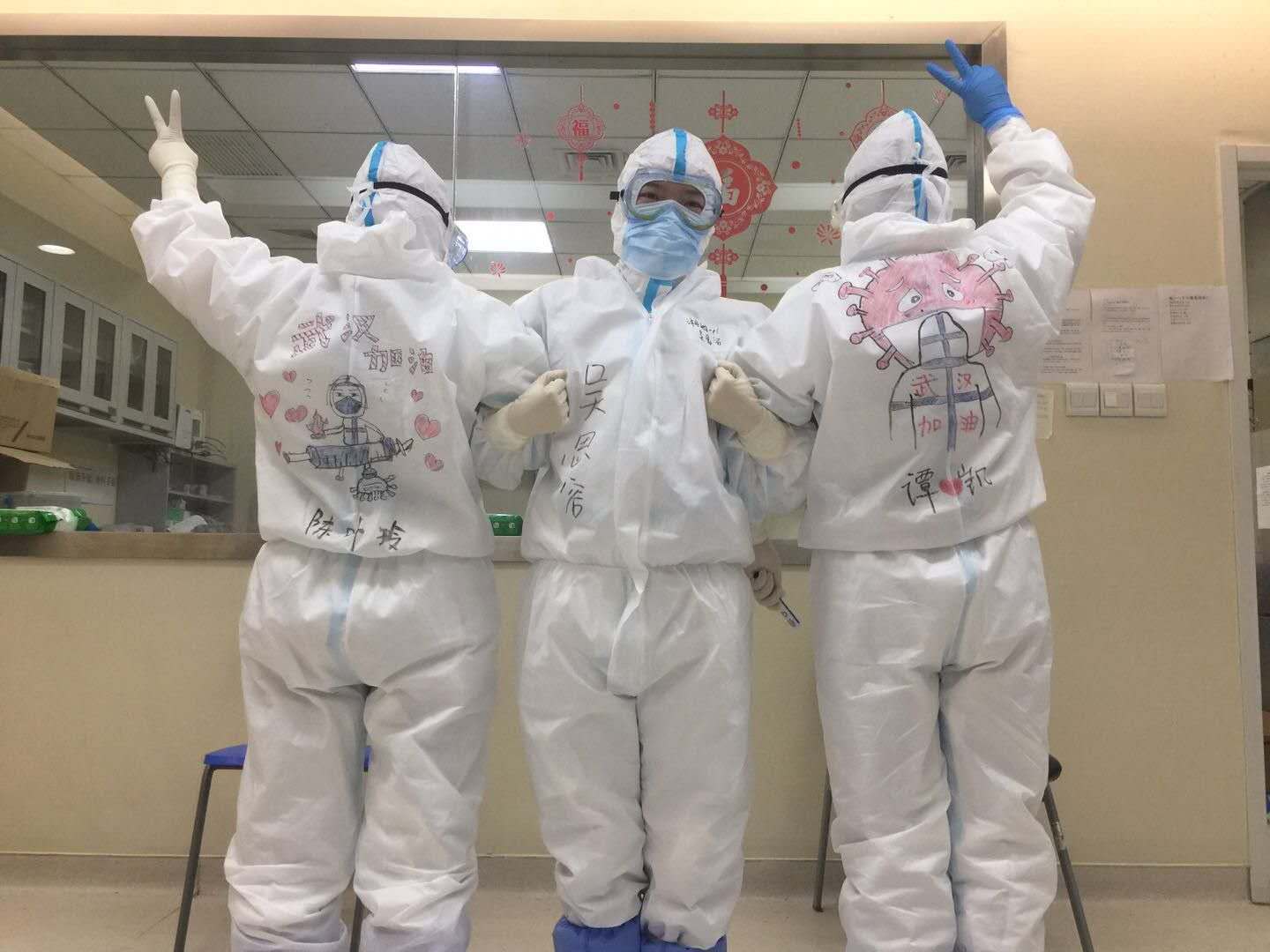 Post-90s frontline nurse draws on colleagues’ protective suits to boost morale