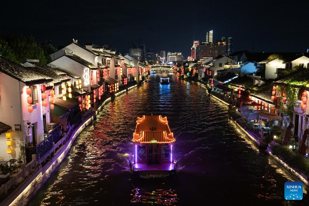 Ancient canal in China's Wuxi attracts more visitors with modern tech